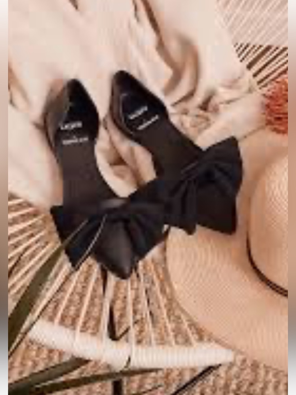 Native Black Pointed-Toe Flats with Removable Bow.  New in box!
